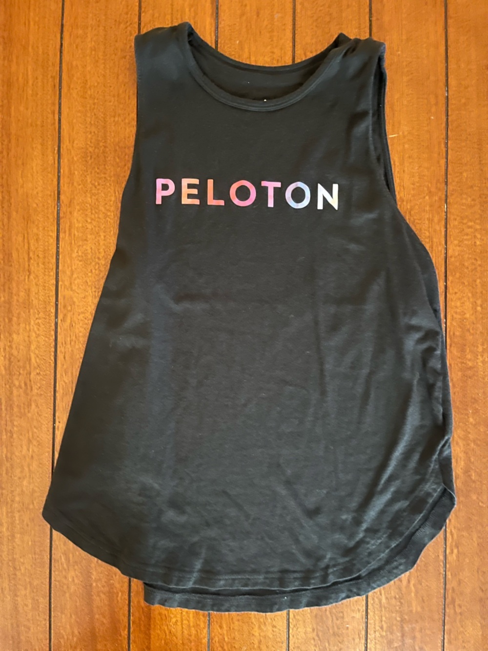 Peloton Black Tank with Pink-to-Blue Gradient Vertical Logo